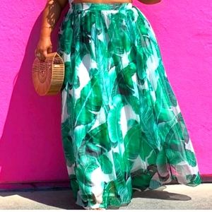 ASTRA palm print maxi skirt.